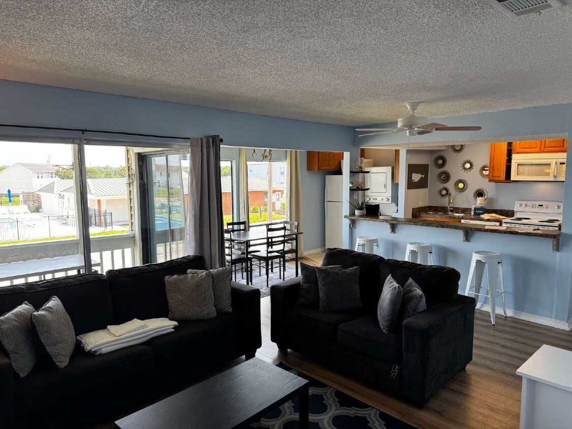 Primary Photo - "Coastal Comfort Awaits: Spacious 2-Bed, 2...