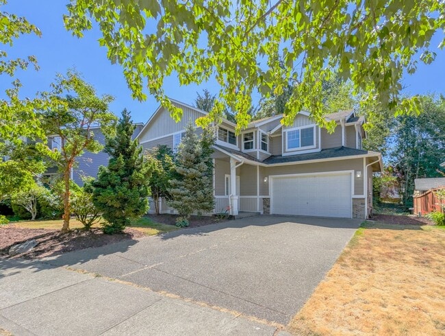 Building Photo - Move in ready 4 bed, 2.5 bath home W/ New Paint & Carpet!