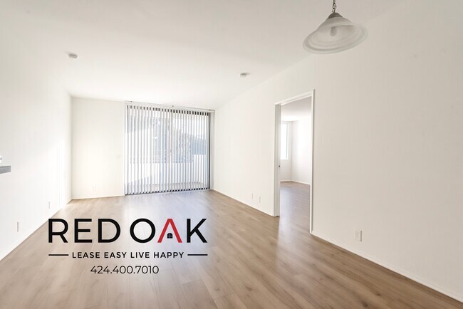 Building Photo - Beautiful Two Bedroom Drenched in Natural ...