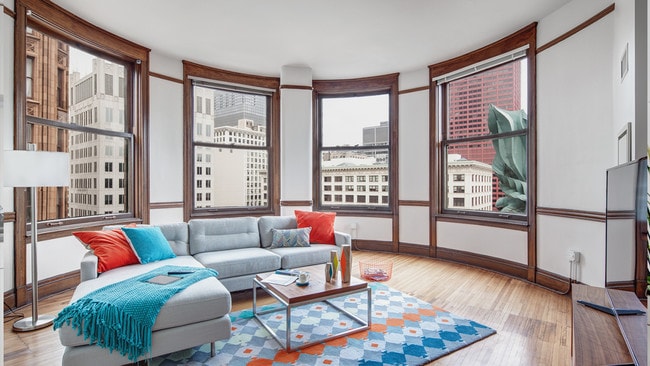 Furnished Living Room with City Views - Arc at Old Colony Apartments