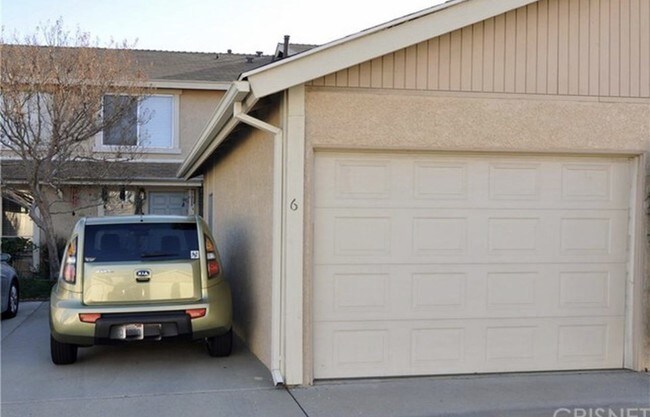 One front drive parking, one garage parking - 10125 De Soto Ave