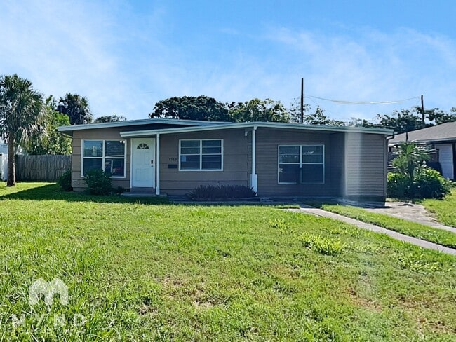 Building Photo - 7563 Meadowlawn Dr N