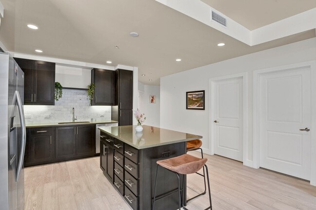 Building Photo - Modern First-Floor Condo at the Peloton - ...