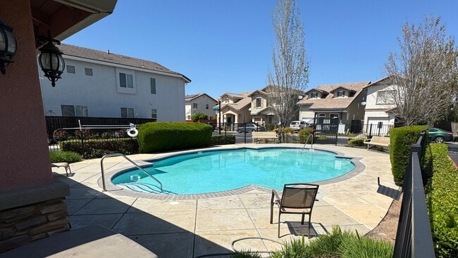 Photo - THREE BEDROOM TWO AND A HALF BATH POOL USE SEE VIDEO House