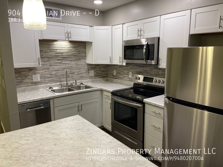 Foto principal - 904 Georgian Dr