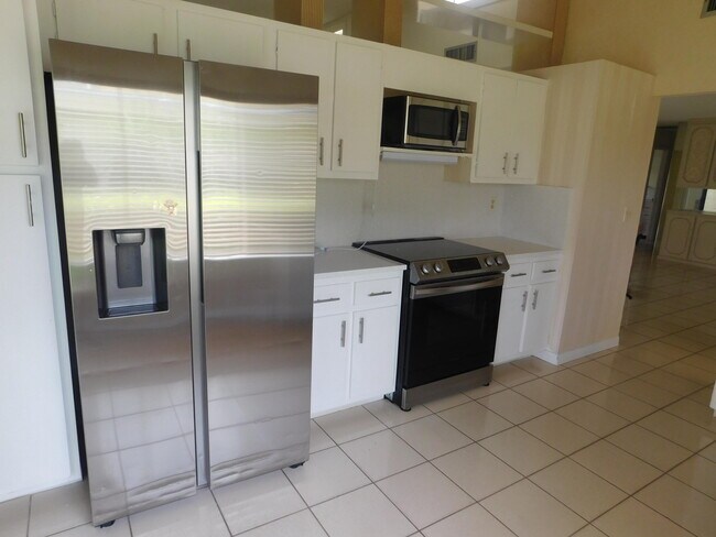 Foto del edificio - 5660 Piping Rock Dr