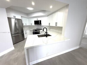 Building Photo - 6767 Collins Ave