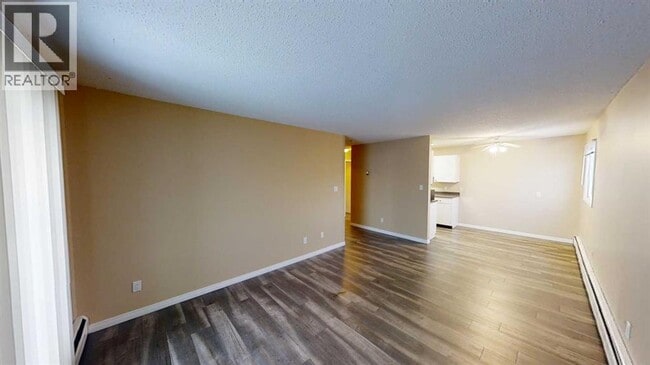 Building Photo - 10028-10105 105 Ave