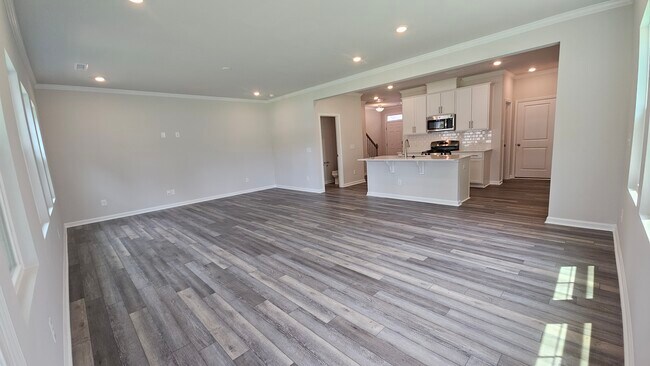 View from the living room into the kitchen - 2207 Cape May Ln