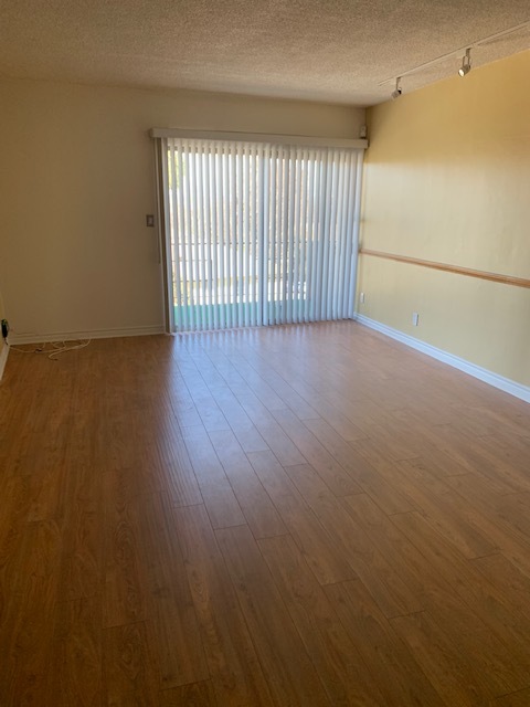 Living Room w/ laminate wood flooring & - 4431 Don Ricardo Dr