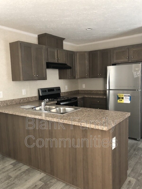 Building Photo - 202 Teakwood Dr