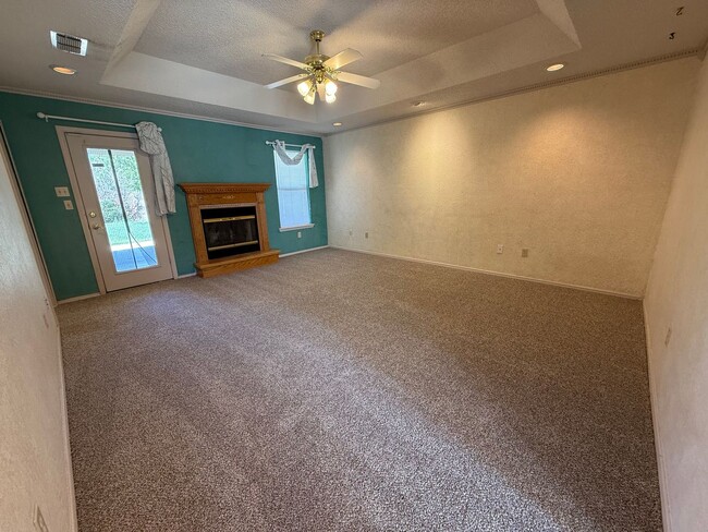 Building Photo - Brick 3 Bedroom Home! Stunning Backyard! M...