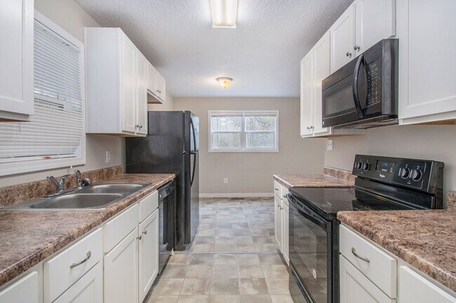 Building Photo - 8341 Happy Top Ln