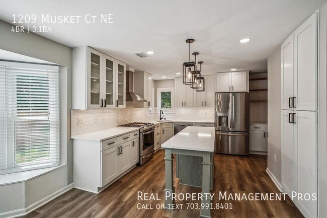 Building Photo - 1209 Musket Ct NE