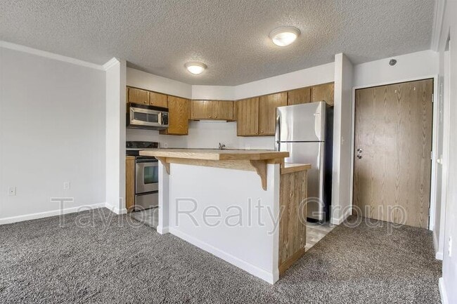 Building Photo - 1301 N Speer Blvd