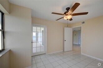 Building Photo - 10044 S Ocean Dr
