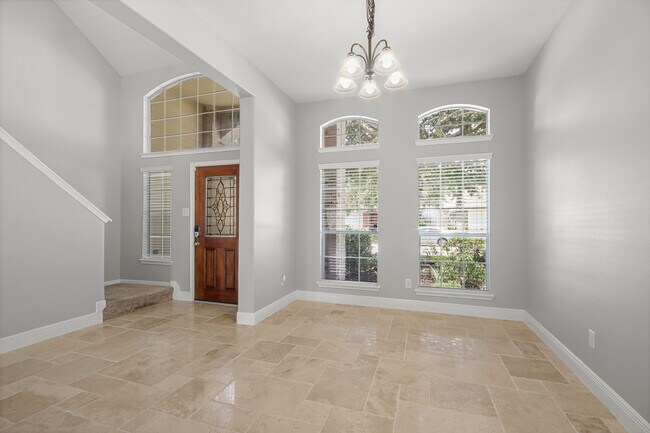 Front dining with vaulted ceilings - 22418 Bridgestone Ridge Dr