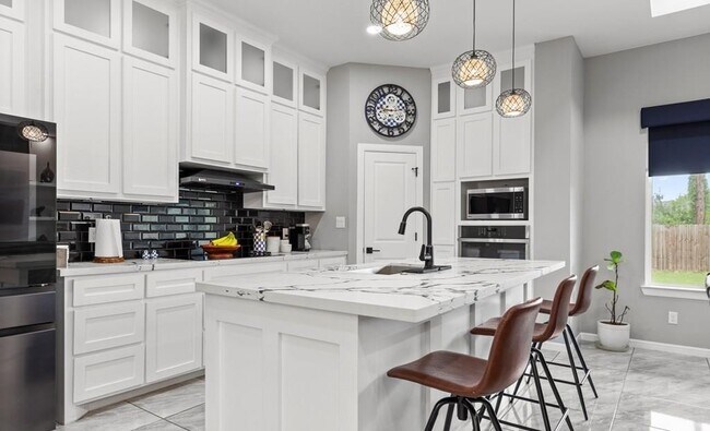 Foto del edificio - 9388 N Queen Palm