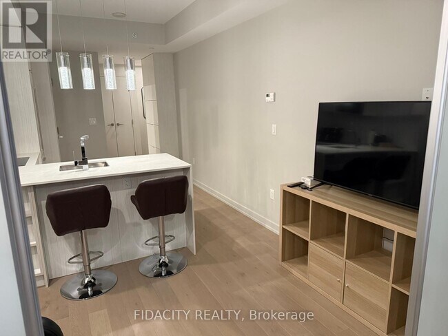 Photo du bâtiment - 101 Queen St