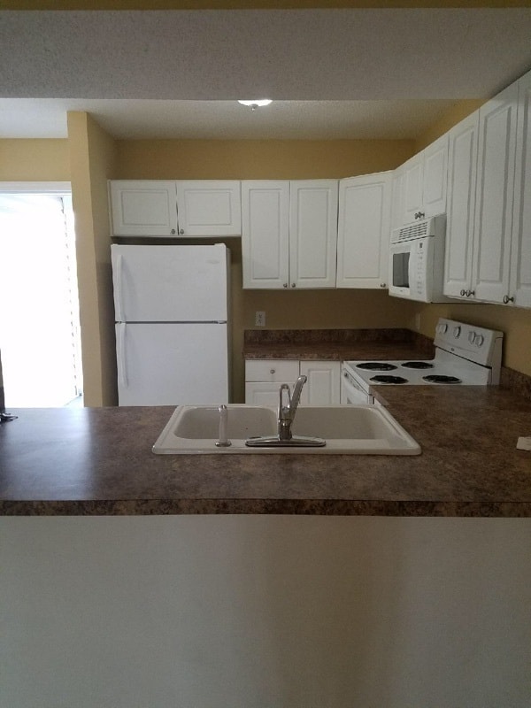 Building Photo - 2 bedroom 2 bath for $1050 a month! Coastal Villas