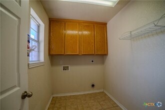 Building Photo - 511 Cowhand Dr