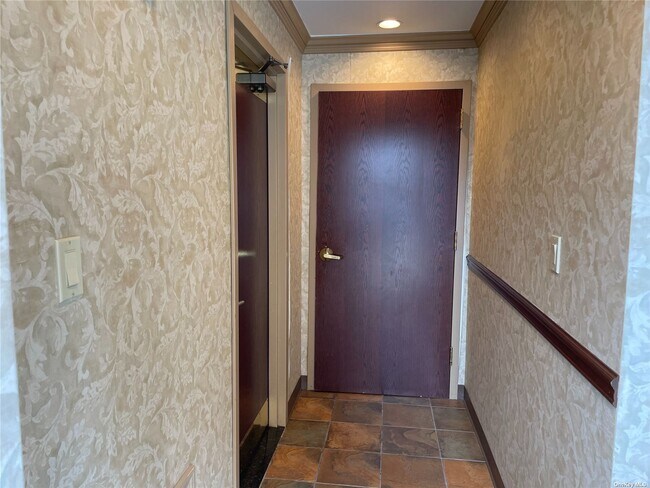 Building Photo - 201-24 43rd Ave