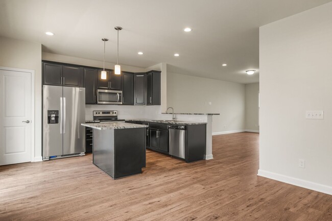 Building Photo - 3 bed / 2 1/2 bath. Garage. Easy commute.