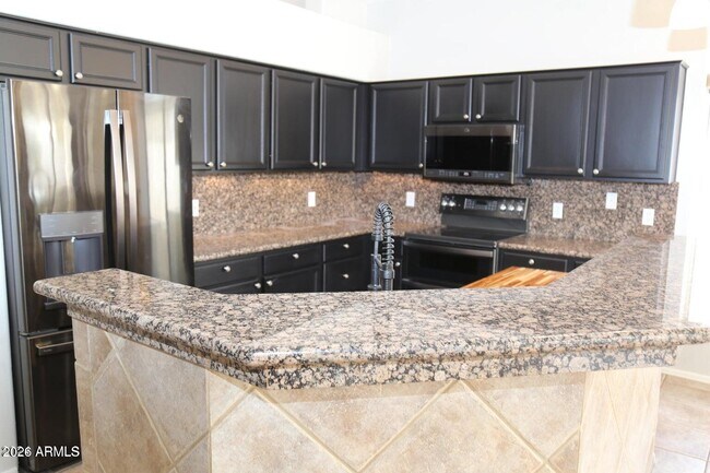 Building Photo - 9345 E Caribbean Ln