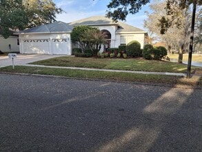 Building Photo - 10385 Emerald Woods Ave