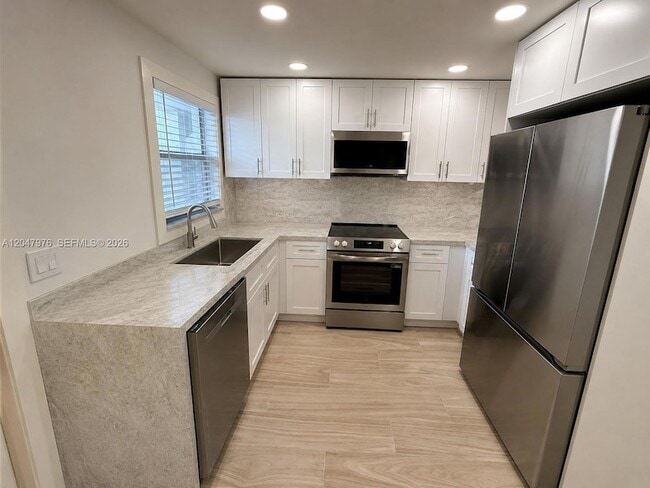 Building Photo - 8600 Sunrise Lakes Blvd