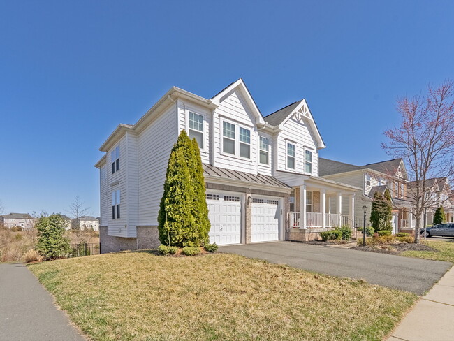 Building Photo - This home offers an open floor plan with s...