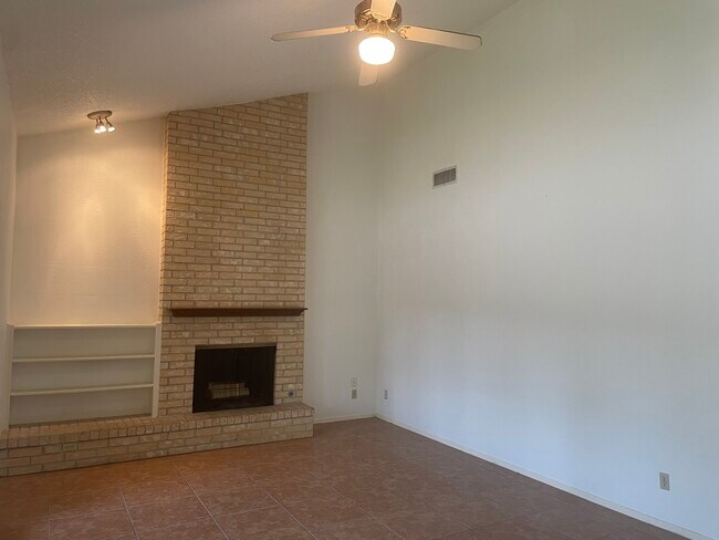 Brick fireplace - 8400 Tallwood Dr