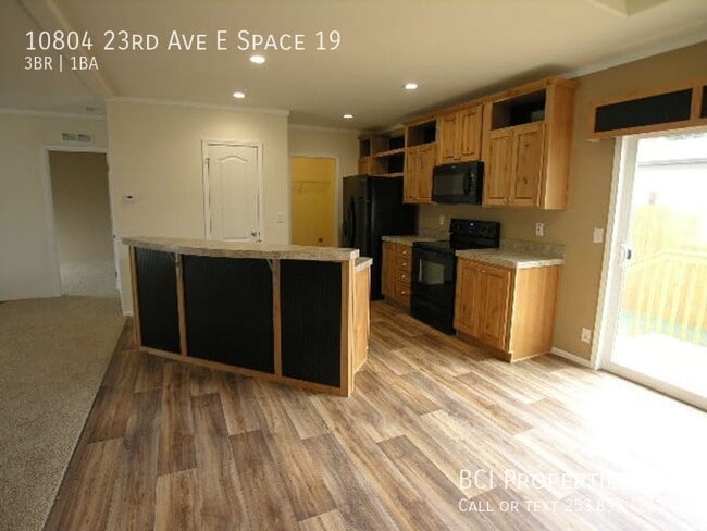 Building Photo - 10804 23rd Ave E