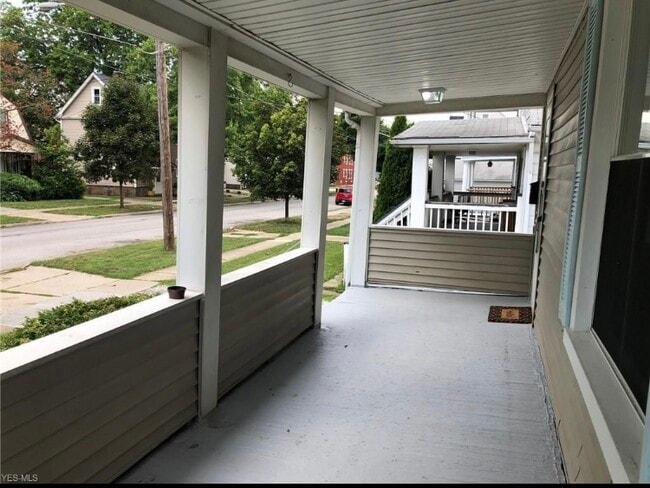 View of large porch in front of the house - 1573 Coutant Ave