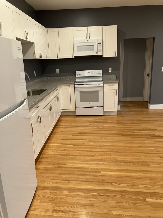 Stove, opening to hallway - 10 S Lake Ave