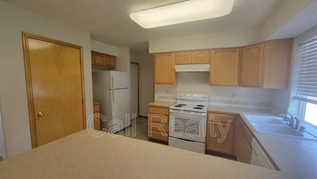 Building Photo - 7120 N Hogan St