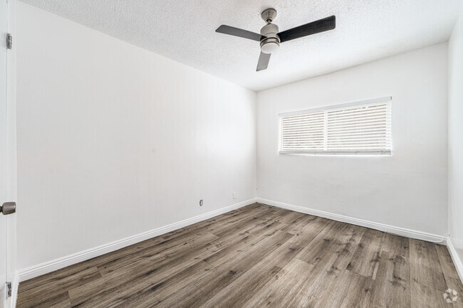 2BR, 1BA - 850SF - Primary Bedroom - The Lakewood Apartments