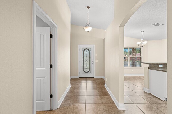 Building Photo - Spacious 4-Bedroom Home - Fenced Backyard