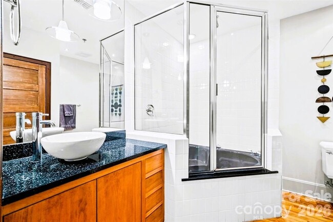 Building Photo - Turn-Key Downtown Asheville Condo | Historic Old Penney’s Building | Rooftop Views