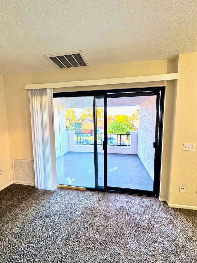 Building Photo - Delightful Upper Unit Mira Mesa Condo Loca...