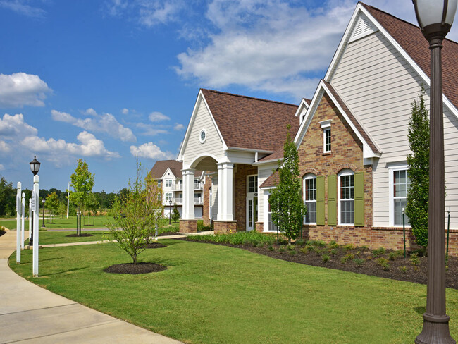 Manicured Lawns - Irene Woods Apartments