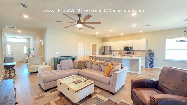 Building Photo - BRILLIANT 4 BEDROOM/2.5 BATH HOME AVAILABLE IN AVIARY at RUTLAND RANCH PARRISH!