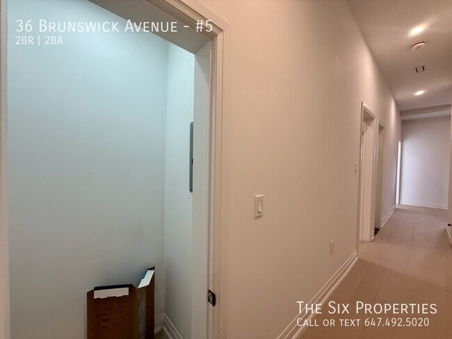 Photo du bâtiment - Brand New 2 Bedroom Top Floor Apartment in the Heart of Downtown