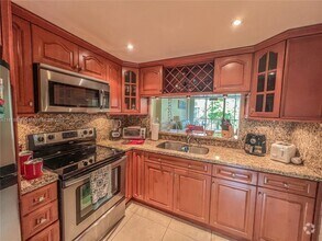 Building Photo - 3301 N Country Club Dr