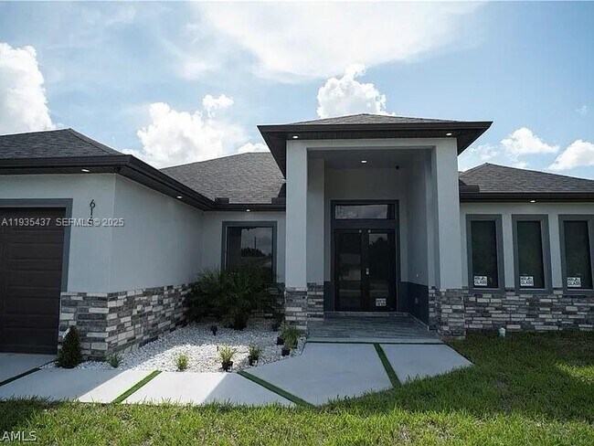 Foto del edificio - 616 Maple Ave N