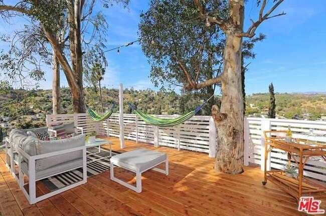 one of the many decks on the property - 4482 Dudley Dr