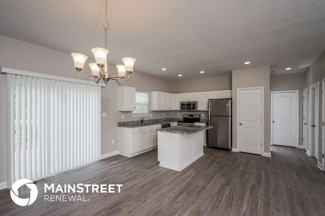 Building Photo - 9135 River Trail Dr