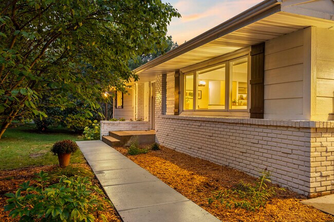 Large living room window and front sidewalk. - 14317 Orchard Rd