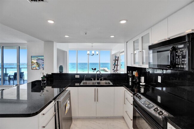 Building Photo - 16699 Collins Ave