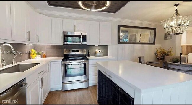 Building Photo - 3 br, 2.5 bath House - 1302 13th Ter